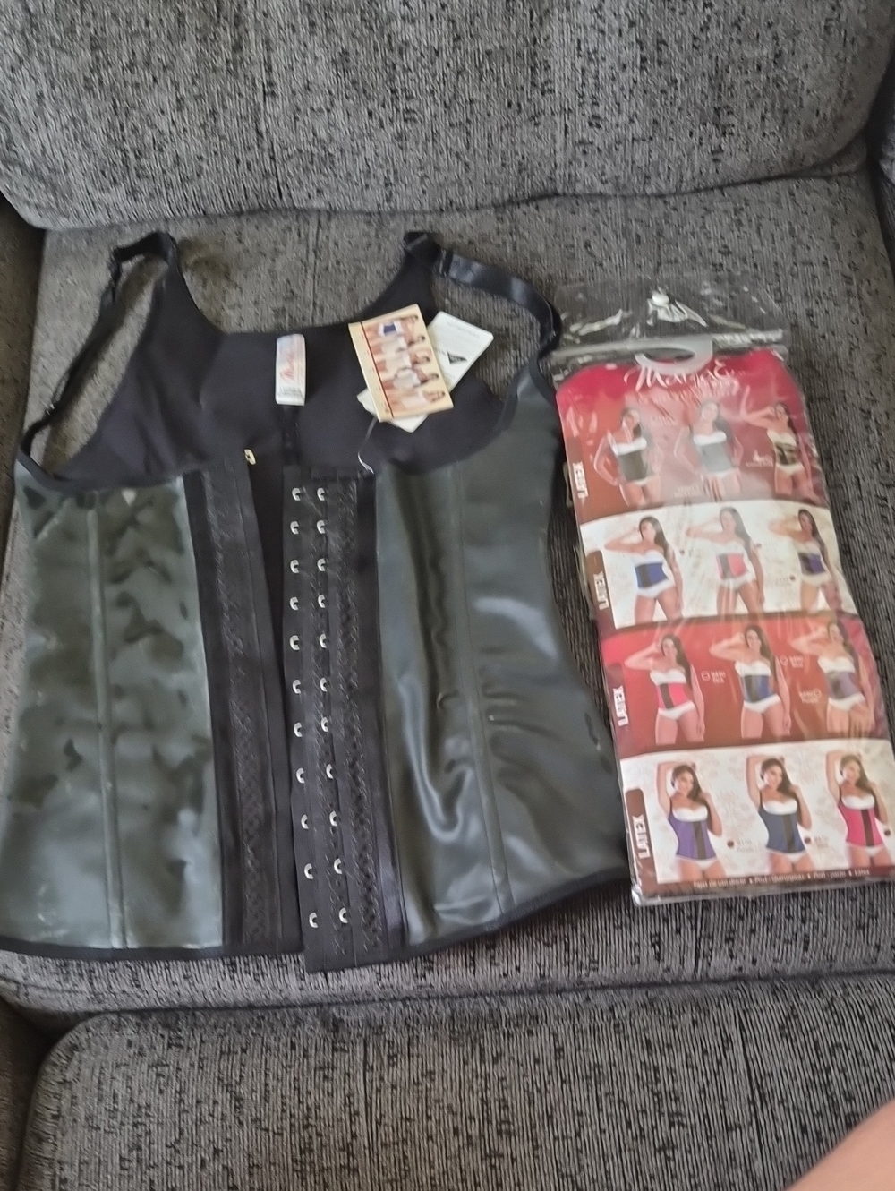 Sleek Black Waist-Shaper Corset Vest with Adjustable Front Hooks
